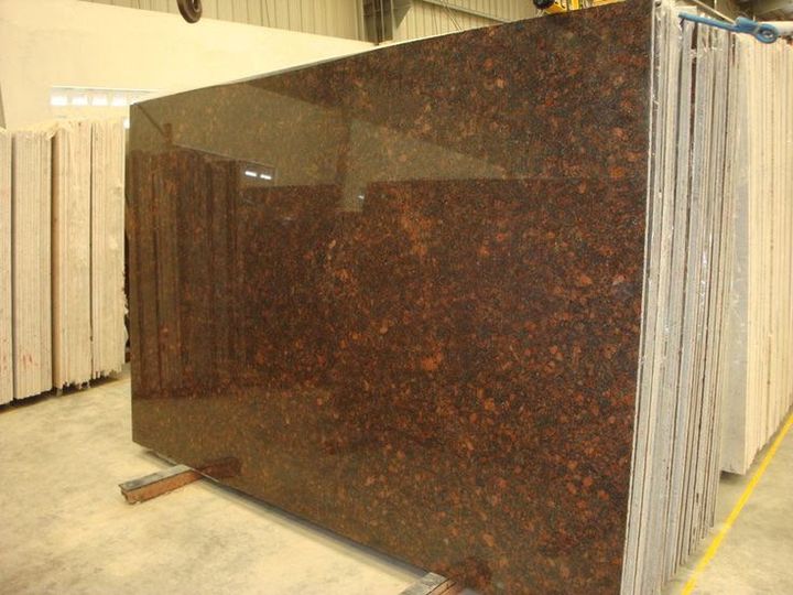 Polished brown and black granite slab